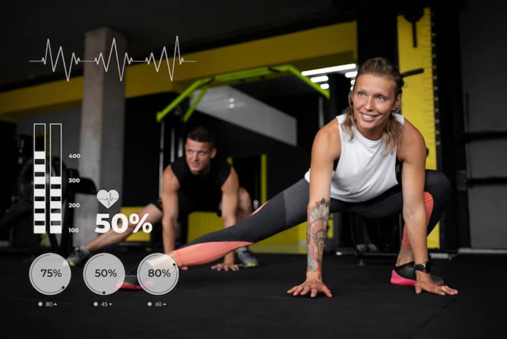 Two individuals are engaged in a fitness workout, showcasing various exercises in a gym with heart rate stats displayed.