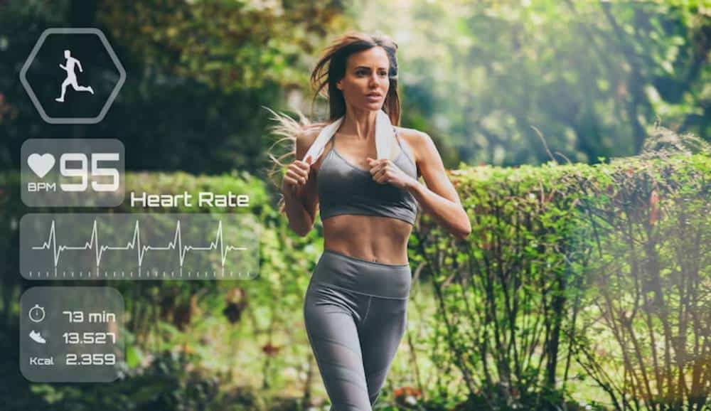 A fit individual runs outdoors in a lush, green setting, with fitness metrics displayed, including heart rate and calories burned.