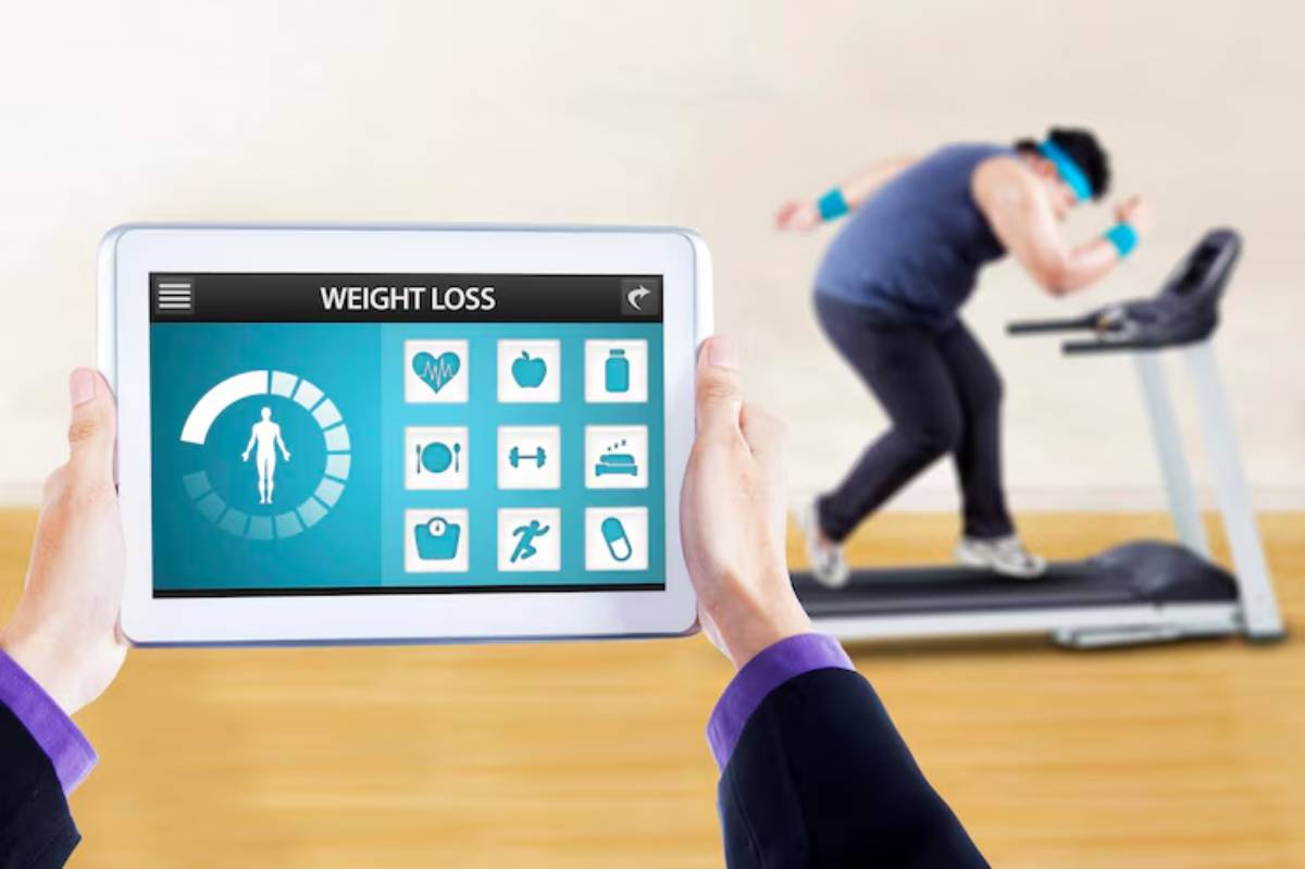 A person runs on a treadmill while another holds a tablet displaying a weight loss app with fitness icons and progress indicators.