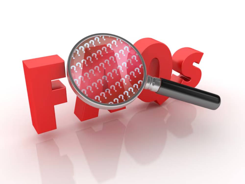 A large red 'FAQs' text with a magnifying glass overlaid, highlighting a pattern of question marks, symbolizing inquiry and answers.